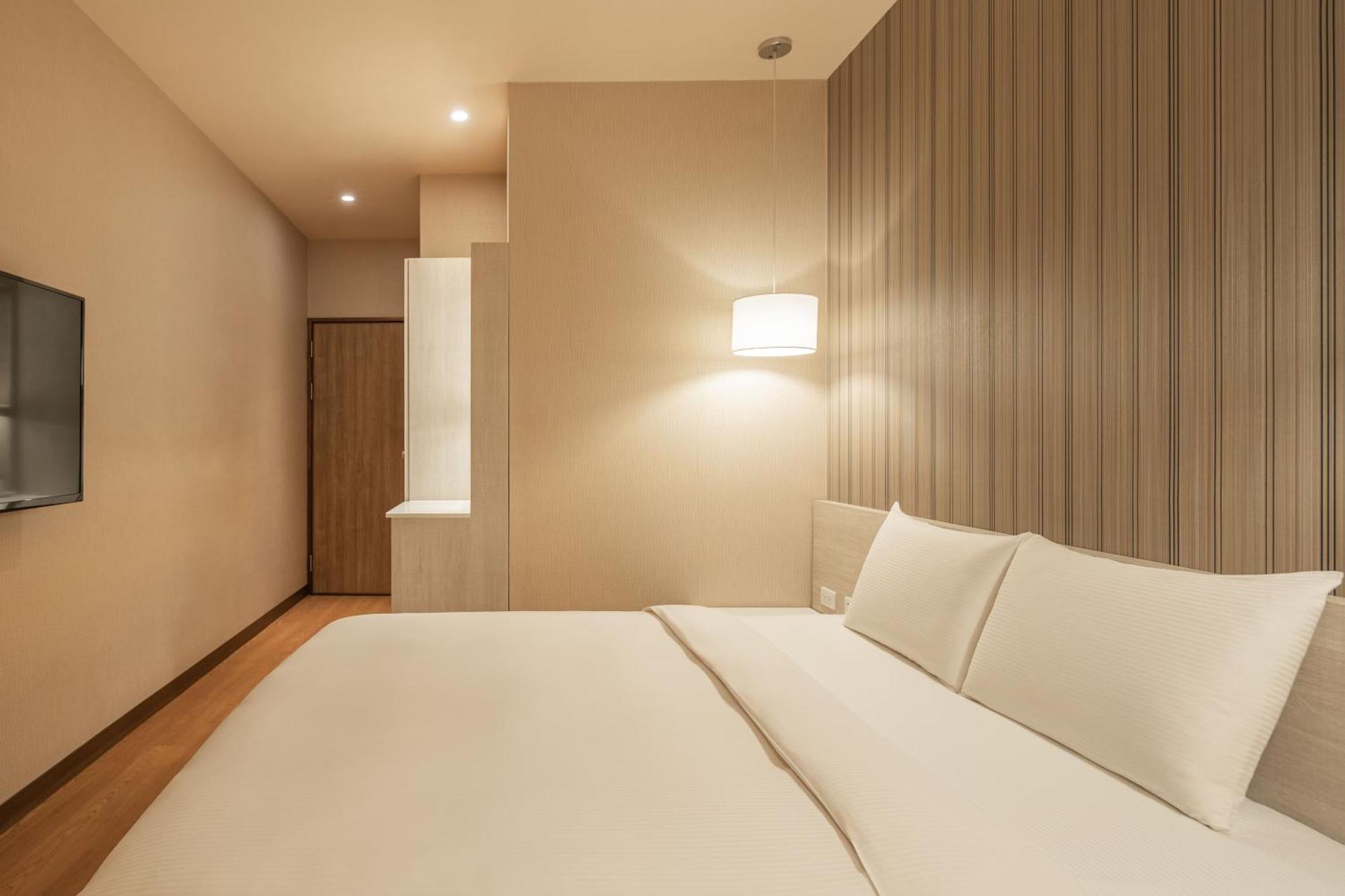 Kindness Hotel-Jue Ming Kaohsiung Habitación foto